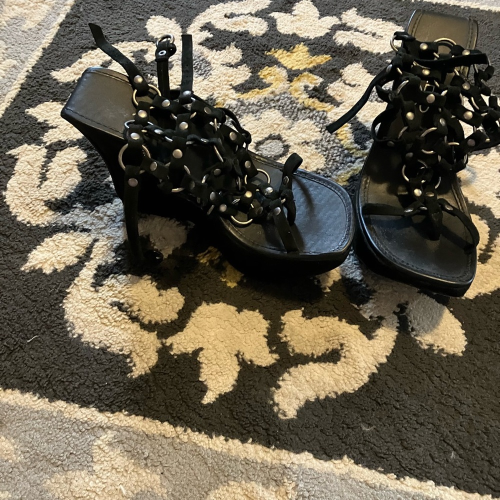 Gladiator style black chunky heels.